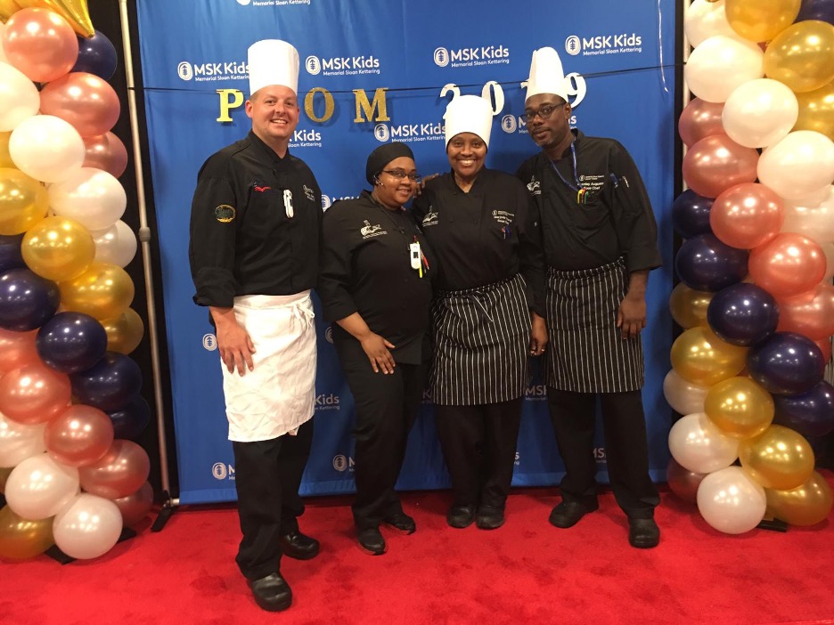 Group of MSK chefs posing at an event