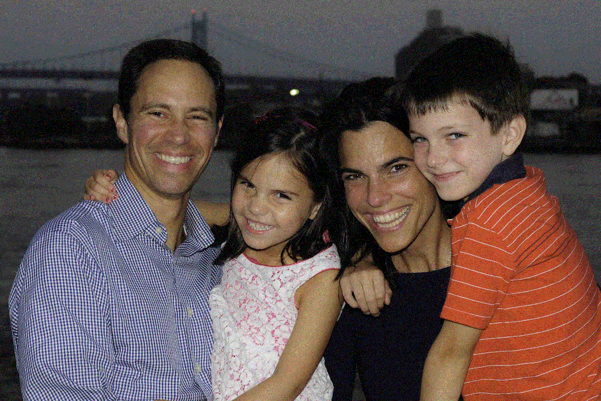 Smiling family with a couple and two children