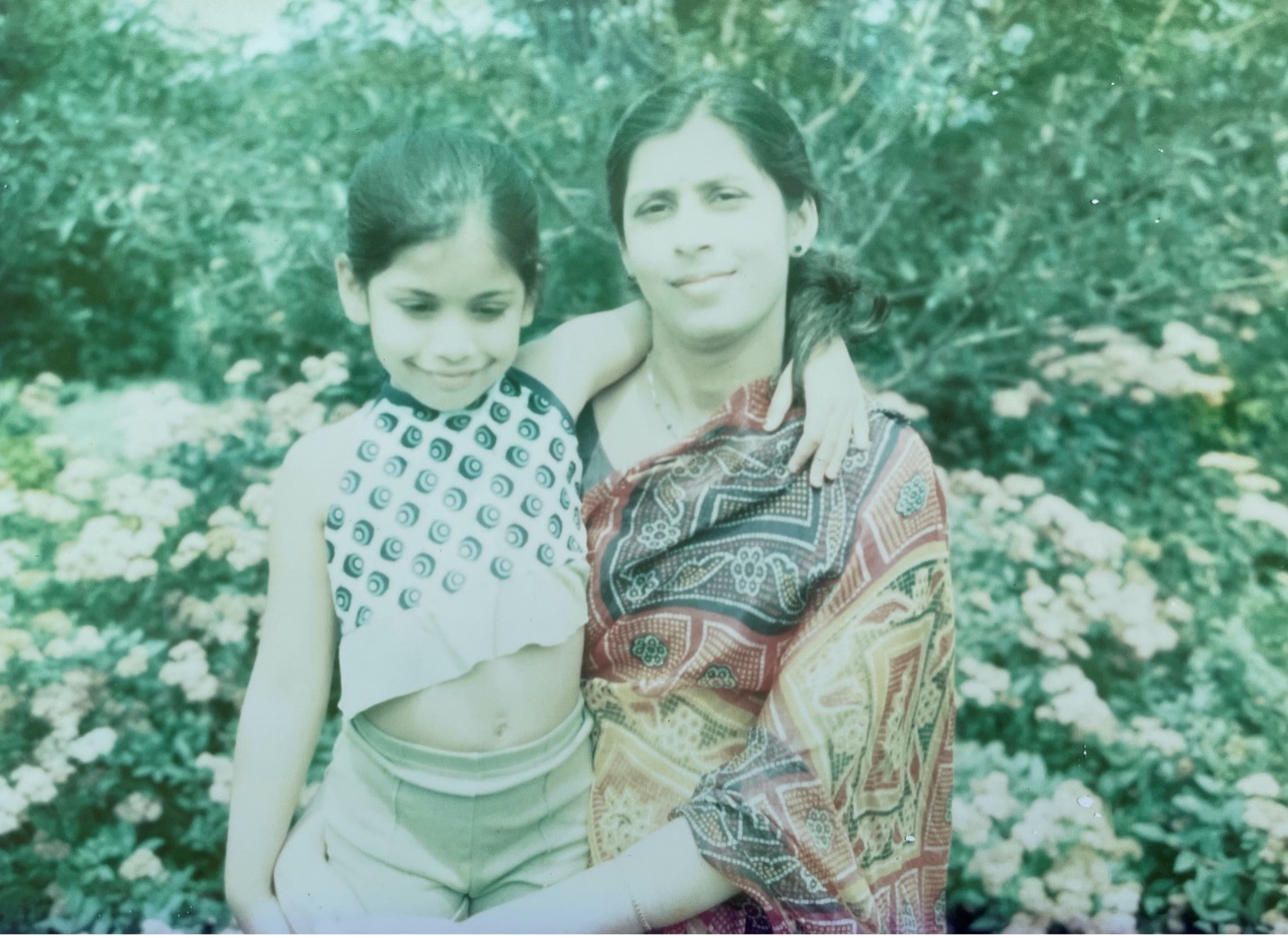 Faded photo of a mother with her daughter